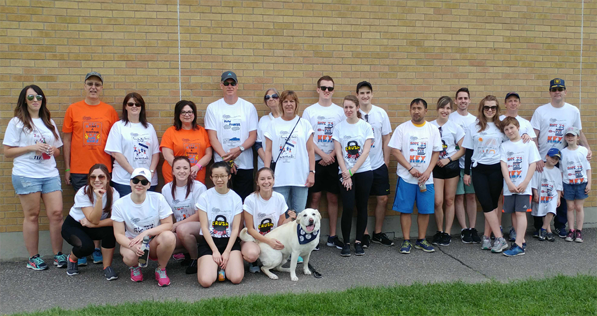 Family and co-workers of Gryphon's Brad Green participate in Rankin Cancer Run.